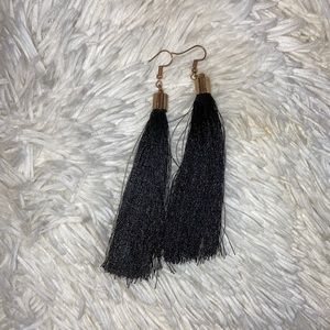 Black tassel earrings with gold hardware